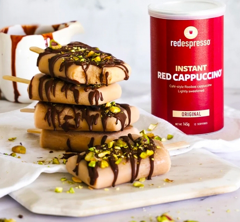 Recipe: Red Cappuccino Popsicles!!! - <p>Ok, how delicious do these popsicles look?! And the new Instant Red Cappuccino tins are giving us all the festive feels!!! These babies only take 5 minutes prep time and then freezing them overnight. ...</p>