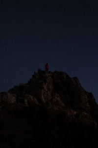 We were initially worried that the summit ridge would be too windy, but it turned out fine.  Here Rob makes the last final steps as the last stars fade from into the indigo dawn.